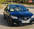 Черный Мазда 3, объемом двигателя 1.6 л и пробегом 284 тыс. км за 5200 $, фото 1 на Automoto.ua