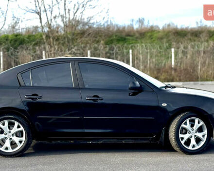 Чорний Мазда 3, об'ємом двигуна 1.6 л та пробігом 237 тис. км за 5850 $, фото 6 на Automoto.ua