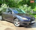 Черный Мазда 3, объемом двигателя 1.6 л и пробегом 265 тыс. км за 4350 $, фото 1 на Automoto.ua