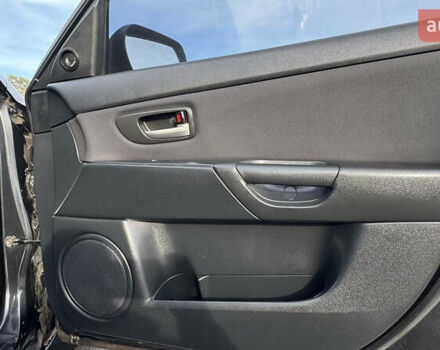 Чорний Мазда 3, об'ємом двигуна 1.6 л та пробігом 237 тис. км за 5850 $, фото 34 на Automoto.ua