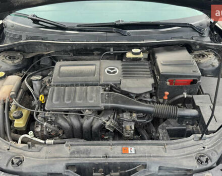 Чорний Мазда 3, об'ємом двигуна 1.6 л та пробігом 237 тис. км за 5850 $, фото 57 на Automoto.ua