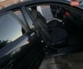 Черный Мазда 3, объемом двигателя 1.6 л и пробегом 173 тыс. км за 5950 $, фото 1 на Automoto.ua