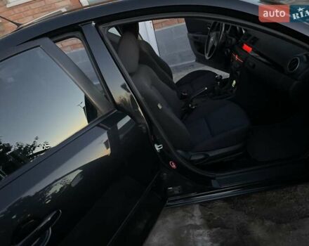 Черный Мазда 3, объемом двигателя 1.6 л и пробегом 173 тыс. км за 6300 $, фото 1 на Automoto.ua