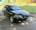 Черный Мазда 3, объемом двигателя 1.6 л и пробегом 285 тыс. км за 4599 $, фото 1 на Automoto.ua