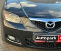 Чорний Мазда 3, об'ємом двигуна 1.6 л та пробігом 232 тис. км за 6740 $, фото 3 на Automoto.ua