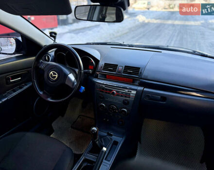 Черный Мазда 3, объемом двигателя 1.6 л и пробегом 210 тыс. км за 3950 $, фото 14 на Automoto.ua
