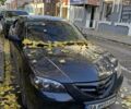 Черный Мазда 3, объемом двигателя 2 л и пробегом 218 тыс. км за 4000 $, фото 1 на Automoto.ua