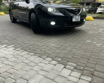 Черный Мазда 3, объемом двигателя 1.6 л и пробегом 206 тыс. км за 6000 $, фото 1 на Automoto.ua