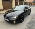 Черный Мазда 3, объемом двигателя 1.6 л и пробегом 200 тыс. км за 4999 $, фото 1 на Automoto.ua