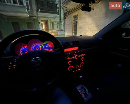 Чорний Мазда 3, об'ємом двигуна 1.6 л та пробігом 177 тис. км за 6100 $, фото 16 на Automoto.ua