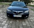 Черный Мазда 3, объемом двигателя 2 л и пробегом 330 тыс. км за 5000 $, фото 1 на Automoto.ua