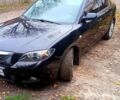 Черный Мазда 3, объемом двигателя 2 л и пробегом 240 тыс. км за 5600 $, фото 5 на Automoto.ua