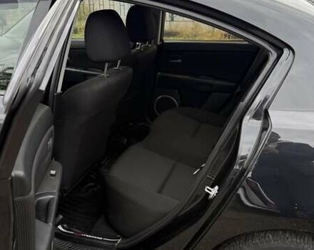 Черный Мазда 3, объемом двигателя 1.6 л и пробегом 175 тыс. км за 4700 $, фото 3 на Automoto.ua