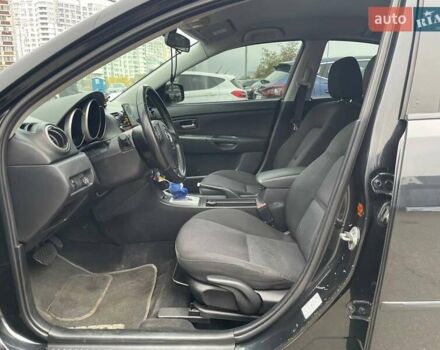 Чорний Мазда 3, об'ємом двигуна 1.6 л та пробігом 223 тис. км за 6490 $, фото 7 на Automoto.ua