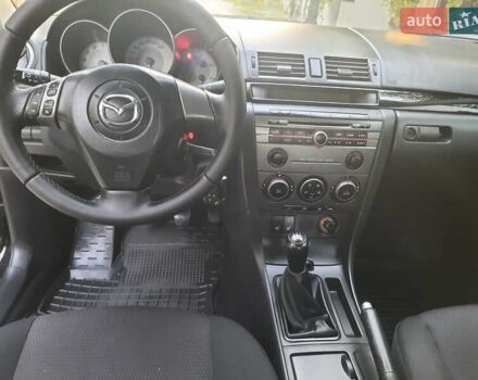 Черный Мазда 3, объемом двигателя 1.6 л и пробегом 188 тыс. км за 5600 $, фото 18 на Automoto.ua