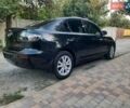 Черный Мазда 3, объемом двигателя 1.6 л и пробегом 188 тыс. км за 5600 $, фото 1 на Automoto.ua