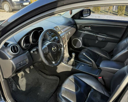 Черный Мазда 3, объемом двигателя 2 л и пробегом 154 тыс. км за 5500 $, фото 6 на Automoto.ua