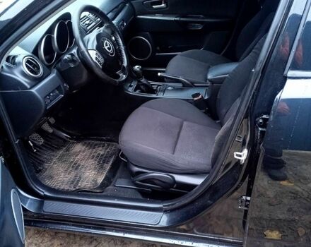 Черный Мазда 3, объемом двигателя 2 л и пробегом 240 тыс. км за 5600 $, фото 7 на Automoto.ua