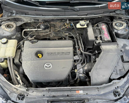 Черный Мазда 3, объемом двигателя 2 л и пробегом 154 тыс. км за 5500 $, фото 11 на Automoto.ua