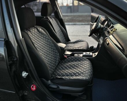 Черный Мазда 3, объемом двигателя 1.6 л и пробегом 290 тыс. км за 4400 $, фото 12 на Automoto.ua