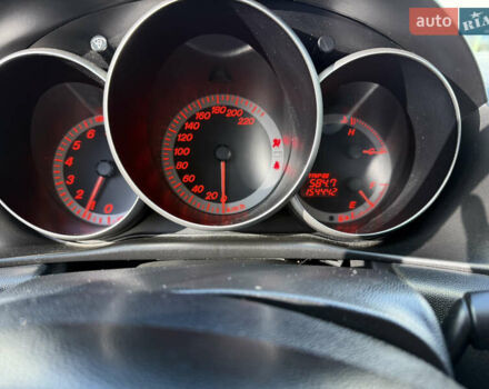 Черный Мазда 3, объемом двигателя 2 л и пробегом 154 тыс. км за 5500 $, фото 10 на Automoto.ua