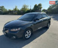 Черный Мазда 3, объемом двигателя 2 л и пробегом 150 тыс. км за 5999 $, фото 1 на Automoto.ua