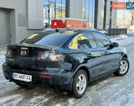 Черный Мазда 3, объемом двигателя 1.6 л и пробегом 210 тыс. км за 3950 $, фото 4 на Automoto.ua