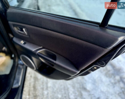 Черный Мазда 3, объемом двигателя 1.6 л и пробегом 210 тыс. км за 3950 $, фото 9 на Automoto.ua