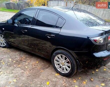 Черный Мазда 3, объемом двигателя 2 л и пробегом 240 тыс. км за 5600 $, фото 14 на Automoto.ua