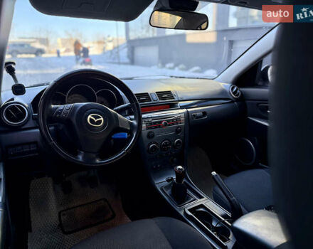 Черный Мазда 3, объемом двигателя 1.6 л и пробегом 210 тыс. км за 3950 $, фото 15 на Automoto.ua