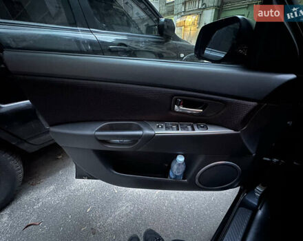 Чорний Мазда 3, об'ємом двигуна 1.6 л та пробігом 177 тис. км за 6100 $, фото 8 на Automoto.ua