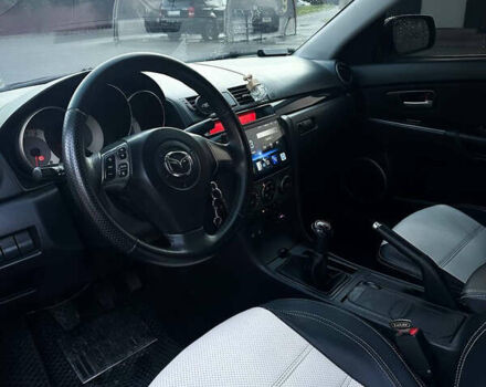 Чорний Мазда 3, об'ємом двигуна 1.6 л та пробігом 199 тис. км за 5500 $, фото 14 на Automoto.ua