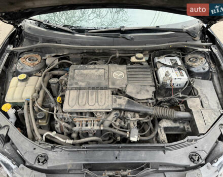Черный Мазда 3, объемом двигателя 1.6 л и пробегом 189 тыс. км за 4300 $, фото 14 на Automoto.ua