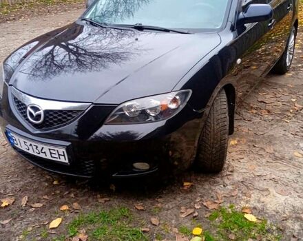 Черный Мазда 3, объемом двигателя 2 л и пробегом 240 тыс. км за 5600 $, фото 1 на Automoto.ua