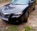 Черный Мазда 3, объемом двигателя 2 л и пробегом 240 тыс. км за 5600 $, фото 1 на Automoto.ua