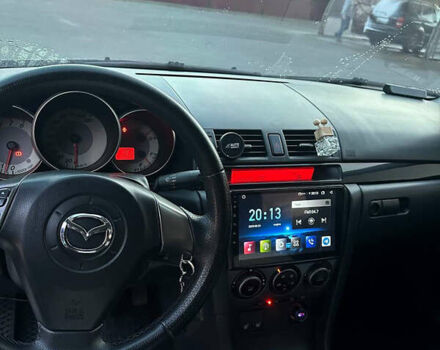 Чорний Мазда 3, об'ємом двигуна 1.6 л та пробігом 199 тис. км за 5500 $, фото 10 на Automoto.ua