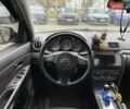Чорний Мазда 3, об'ємом двигуна 1.6 л та пробігом 223 тис. км за 6490 $, фото 12 на Automoto.ua