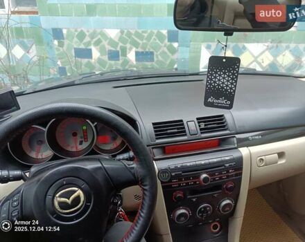 Черный Мазда 3, объемом двигателя 1.6 л и пробегом 232 тыс. км за 5850 $, фото 8 на Automoto.ua