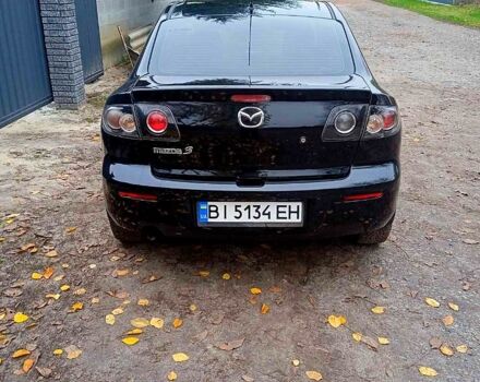 Черный Мазда 3, объемом двигателя 2 л и пробегом 240 тыс. км за 5600 $, фото 3 на Automoto.ua