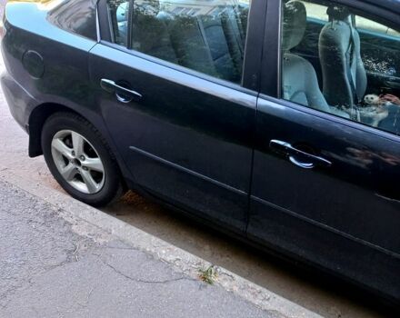 Чорний Мазда 3, об'ємом двигуна 1.6 л та пробігом 247 тис. км за 4200 $, фото 1 на Automoto.ua