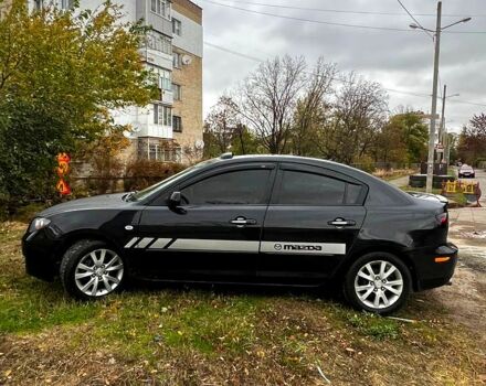 Чорний Мазда 3, об'ємом двигуна 1.6 л та пробігом 181 тис. км за 4500 $, фото 2 на Automoto.ua