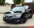 Черный Мазда 3, объемом двигателя 1.6 л и пробегом 201 тыс. км за 5900 $, фото 1 на Automoto.ua