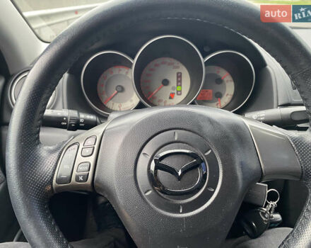 Чорний Мазда 3, об'ємом двигуна 1.6 л та пробігом 188 тис. км за 6800 $, фото 28 на Automoto.ua