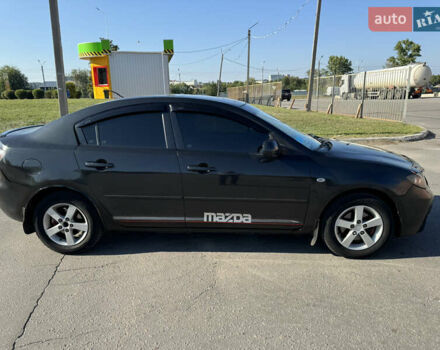 Черный Мазда 3, объемом двигателя 2 л и пробегом 150 тыс. км за 5999 $, фото 5 на Automoto.ua