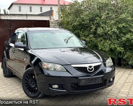 Черный Мазда 3, объемом двигателя 1.6 л и пробегом 201 тыс. км за 5900 $, фото 1 на Automoto.ua