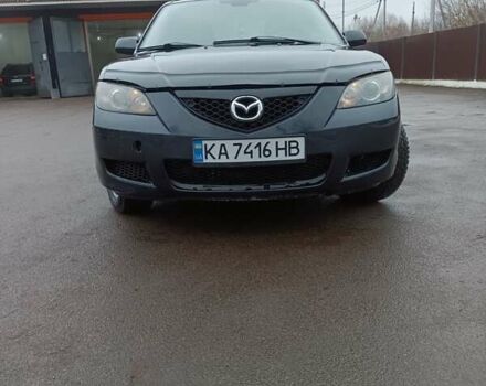 Черный Мазда 3, объемом двигателя 1.6 л и пробегом 232 тыс. км за 5850 $, фото 1 на Automoto.ua