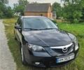 Черный Мазда 3, объемом двигателя 1.6 л и пробегом 212 тыс. км за 4300 $, фото 1 на Automoto.ua