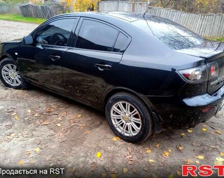 Черный Мазда 3, объемом двигателя 2 л и пробегом 240 тыс. км за 5600 $, фото 5 на Automoto.ua