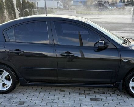 Черный Мазда 3, объемом двигателя 2 л и пробегом 154 тыс. км за 5500 $, фото 2 на Automoto.ua