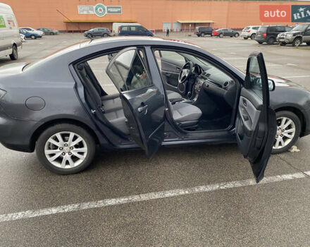 Чорний Мазда 3, об'ємом двигуна 1.6 л та пробігом 188 тис. км за 6800 $, фото 14 на Automoto.ua